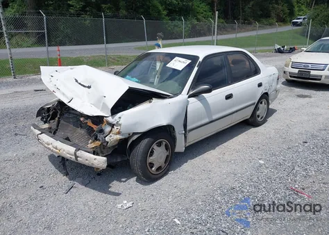 1999 Toyota Corolla Ce from USA, damaged, VIN 2T1BR12E5XC183053